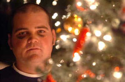 
Spokane City firefighter Kevin Smith is recuperating at home with a broken nose and two black eyes Tuesday. He was riding on a firetruck in the downtown corridor dressed as Santa Saturday night when he was struck by some object thrown at him, knocking him out and breaking his nose. 
 (Jesse Tinsley / The Spokesman-Review)