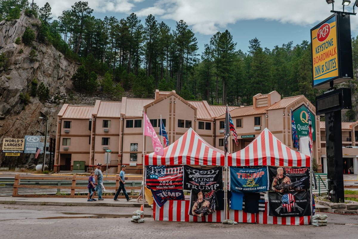 A booth selling Donald Trump themed merchandise ahead of a Republican rally that the former president was to attend, in Keystone, S.D., Sept. 7, 2023. Many of the Republican Party