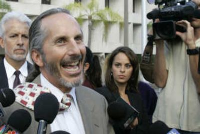 
Joel DeFabio, attorney for Lyglenson Lemorin, talks to reporters as he leaves federal court in Miami on Thursday. Associated Press
 (Associated Press / The Spokesman-Review)