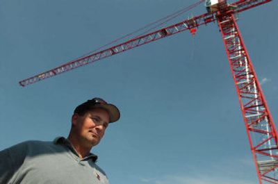 
Scott Beeler spends more than eight hours a day on a tower crane helping to build  the 20-story Parkside  in Coeur d'Alene. 
 (Jesse Tinsley / The Spokesman-Review)