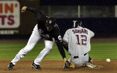 
 Alfonso Soriano, right, steals second base safely for the Washington Nationals. 
 (Associated Press / The Spokesman-Review)