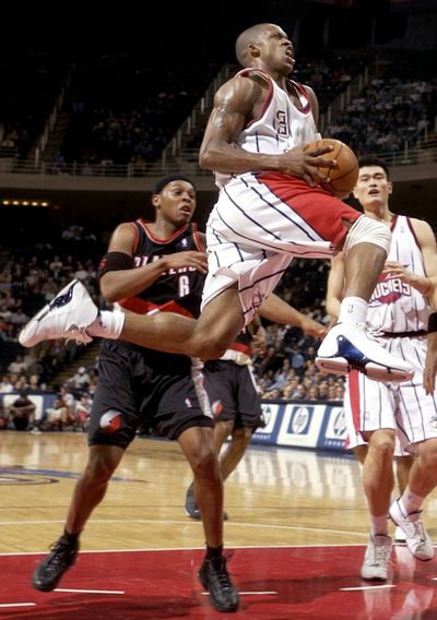 Steve Francis, with ball, never got a chance to score for Memphis.  (Associated Press / The Spokesman-Review)