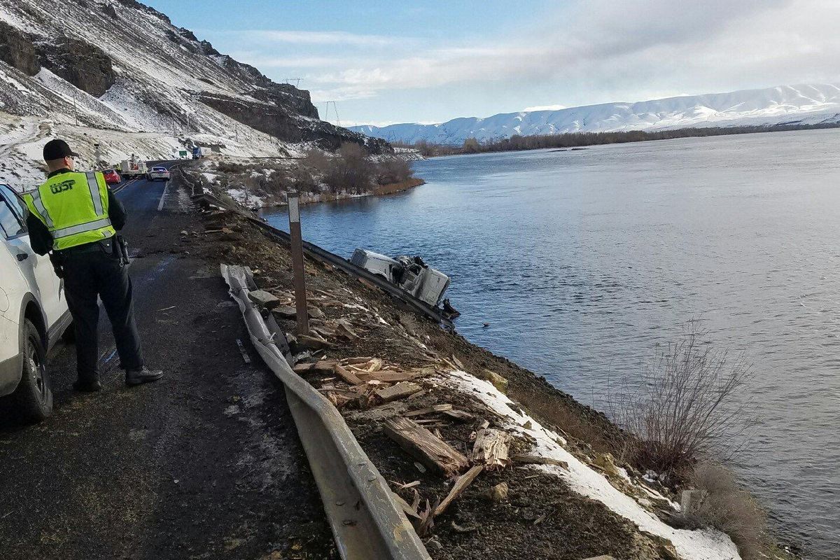 A semi-truck full of apples plunged into the Columbia River, Monday afternoon. The truck’s refrigerated trailer full of apples detached and is currently floating toward the the Priest Rapids Dam. (Trooper Brian Moore)