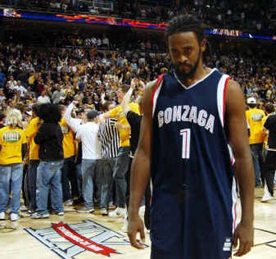 
Gonzaga's Ronny Turiaf walks off the court after suffering one of his most disappointing games. Turiaf, averaging 19 points a game, scored just six. 
 (Associated Press / The Spokesman-Review)