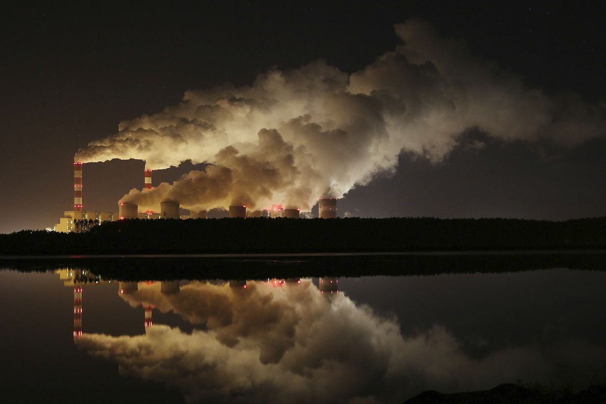 File-File photo shows clouds of smoke over Europe's largest lignite power plant in Belchatow, central Poland, on Wednesday, Nov. 28, 2018.  (Czarek Sokolowski)