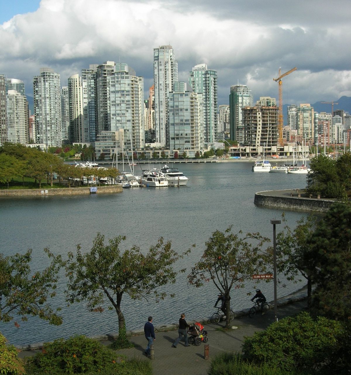 The False Creek walkway in Vancouver begins near Granville Island and winds around to the north shore of the inlet where there’s a forest of high-rise condos.