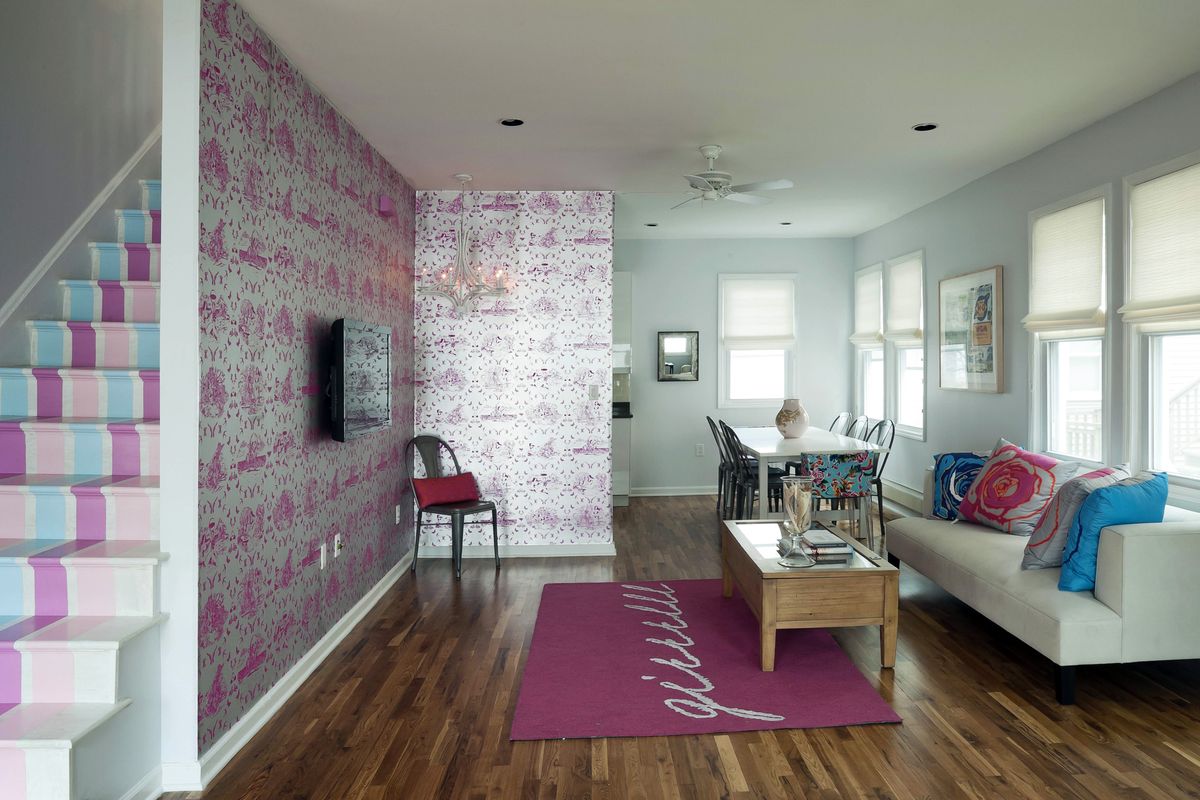 Cortney and Robert Novogratz from HGTV’s “Home by Novogratz” designed this home in Rockaway Beach, N.Y., with striped staircases and lavender walls.
