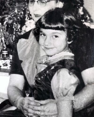 FILE - In this undated file family photo via the Chicago Sun-Times, Maria Ridulph is seen with family members in Illinois. Closing arguments are expected Friday, Sept. 14, 2012, in Sycamore, Ill., at the trial for Jack McCullough, 72,  former police officer accused of killing Ridulph in Sycamore, Ill., in 1957 after kidnapping her as she played in a small-town street, marking one of the oldest cold-case murders to make it to court. (Courtesy The Ridulph Family Via The Chicago Sun-times)