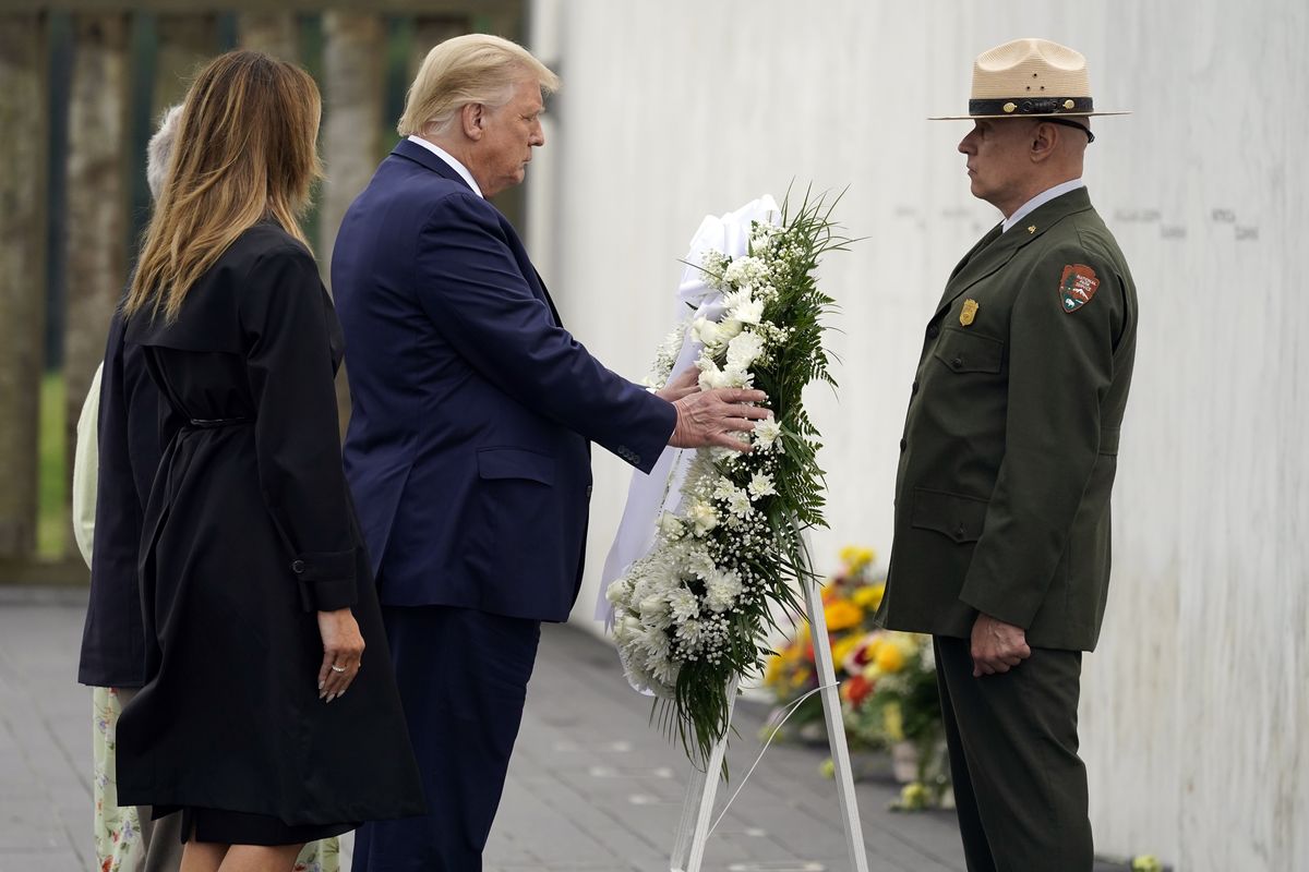 President Donald Trump lays a wreath at a 19th anniversary observance of the Sept. 11 terror attacks, at the Flight 93 National Memorial in Shanksville, Pa., Friday, Sept. 11, 2020.  (Associated Press)