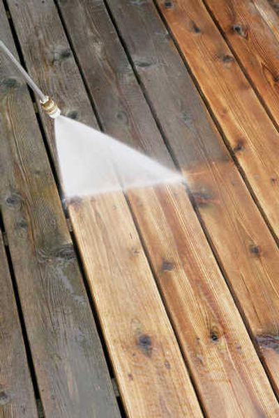 
You have at least two choices when you decide to clean a wood deck: a pressure washer and oxygen bleach. Tribune Media Services
 (Tribune Media Services / The Spokesman-Review)