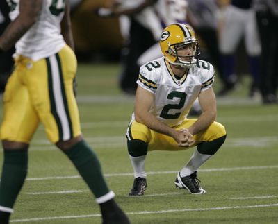 Mason Crosby of the Packers reacts after missing a 52-yard field goal with less than a minute left.  (Associated Press / The Spokesman-Review)