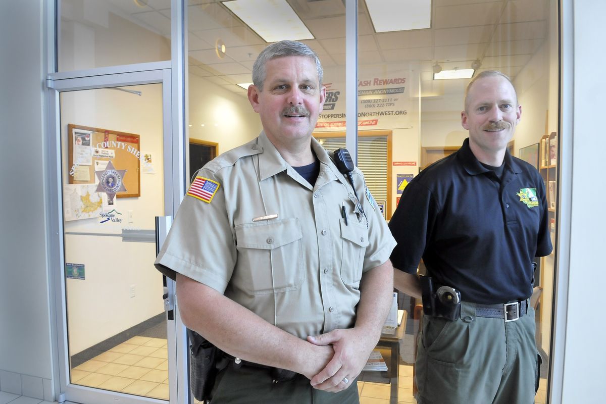 Spokane County Sheriff’s deputies Greg Snyder and Travis Pendell are crime prevention officers who work out of the Spokane Valley Mall. (Jesse Tinsley)