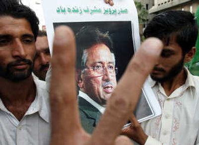 
Supporters of Pakistan President Pervez Musharraf celebrate his victory in Karachi today. Associated Press
 (Associated Press / The Spokesman-Review)