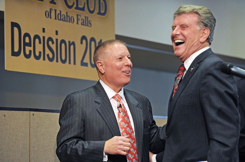 Republican Incumbent Butch Otter, right, and Democratic Challenger AJ Balukoff laugh as they compliment each other’s ties after the gubernatorial debate hosted by the City Club of Idaho Falls at the Idaho State University Bennion Student Union Building Thursday, Oct. 9, 2014. (Pat Sutphin / Idaho Post-Register)