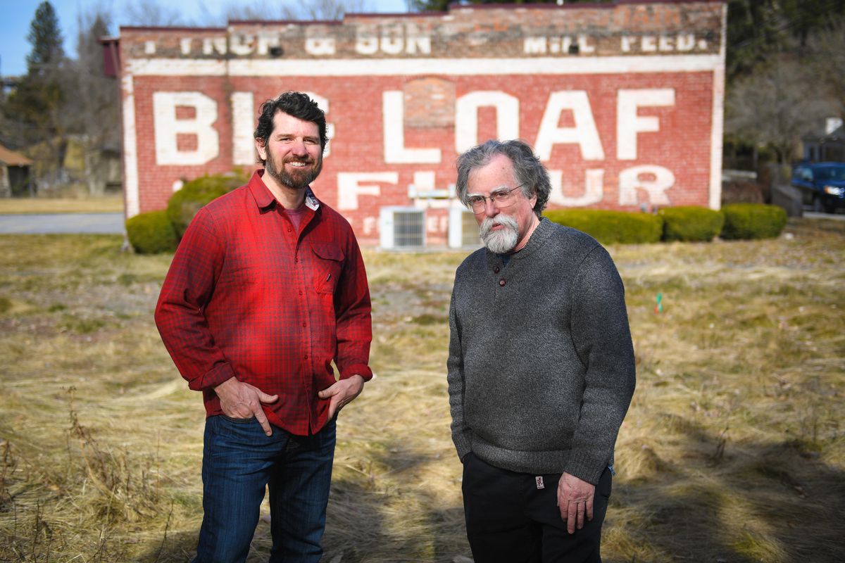 Latah Hangman Neighborhood Council’s vice chair Pat Davidson, left, and council chair Kai Huschke pose for a photo in their Vinegar Flats neighborhood. (Colin Mulvany / The Spokesman-Review)