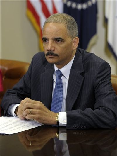 Attorney General Eric Holder speaks in the Cabinet Room of the White House in Washington, Thursday, July 26, 2012, where he announced the formation of a public-private partnership to fight fraud in the health care system. ( (Susan Walsh / AP Photo)