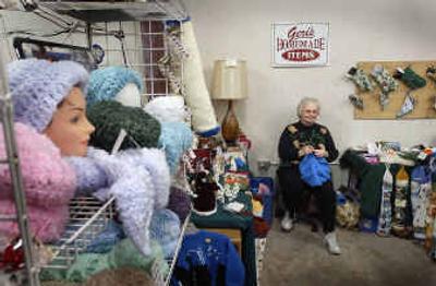 
Geri Kingery crochets at her booth during a Saturday sale at Eden's Off Barker Weekend Market.
 (Brian Plonka / The Spokesman-Review)