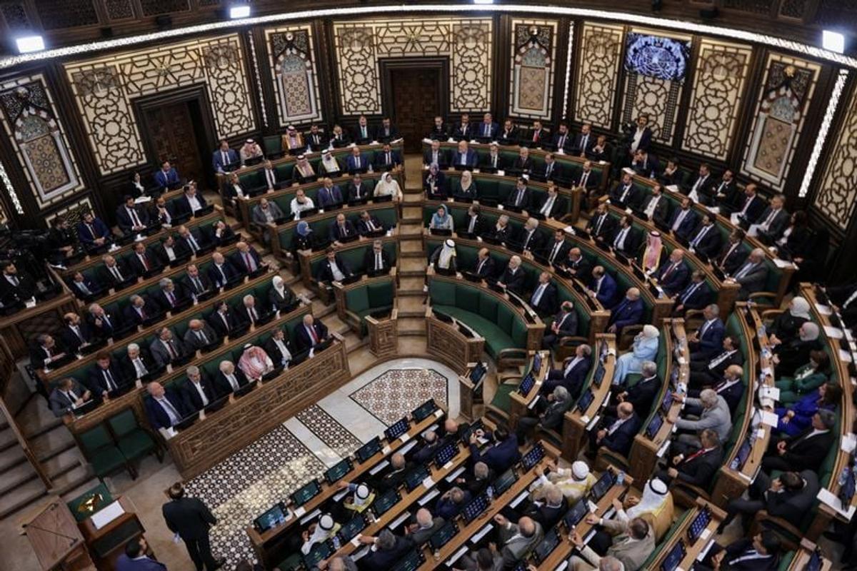 Members of Syria’s newly formed People’s Assembly attend the body’s inaugural session, the first parliament session since the end of the rule of ousted Syrian President Bashar al-Assad, in Damascus, Syria, July 12, 2026. REUTERS/Khalil Ashawi  (Khalil Ashawi)