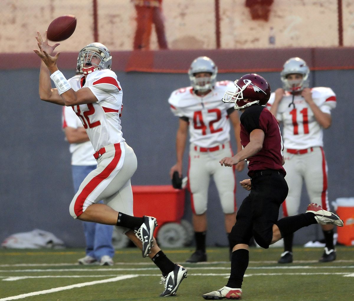 Ferris’ Jason Bates gathers in a pass reception that went for an 85-yard touchdown against North Central. (Dan Pelle / The Spokesman-Review)