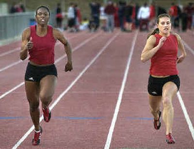 
Sprinters Vernee Samuel, left, and Tanya Pater are two of the 11 women's track athletes who are redshirting at the University of Idaho this spring, preparing for next year's entrance into the WAC. 
 (Brian Plonka / The Spokesman-Review)