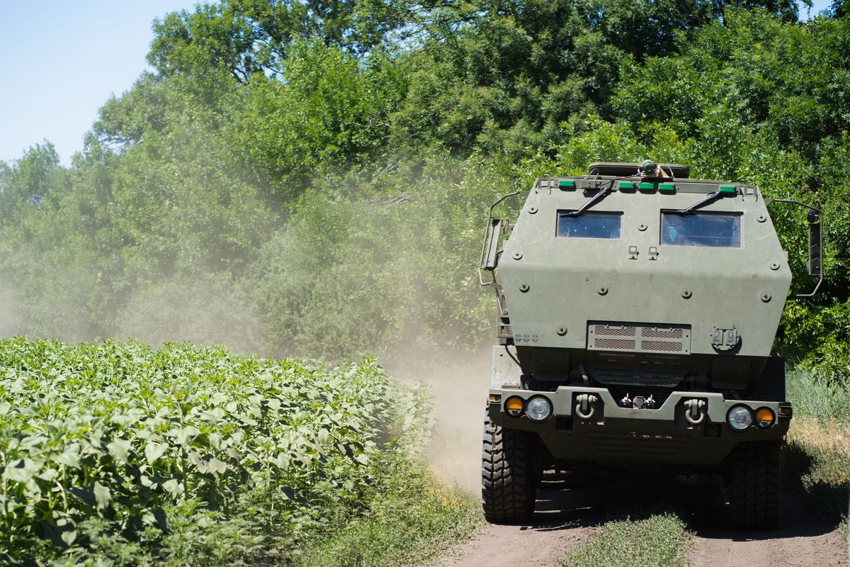 An HIMARS vehicle drives on the road in Eastern Ukraine on July 1. MUST CREDIT: Photo for The Washington Post by Anastasia Vlasova  (Anastasia Vlasova/For The Washington Post)