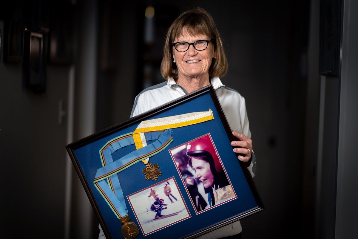 Spokane resident Susie Corrock Luby, 70, poses with the bronze medal (blue sash) she won in downhill skiing at the 1972 Olympics in Sapporo, Japan.  (COLIN MULVANY/THE SPOKESMAN-REVI)