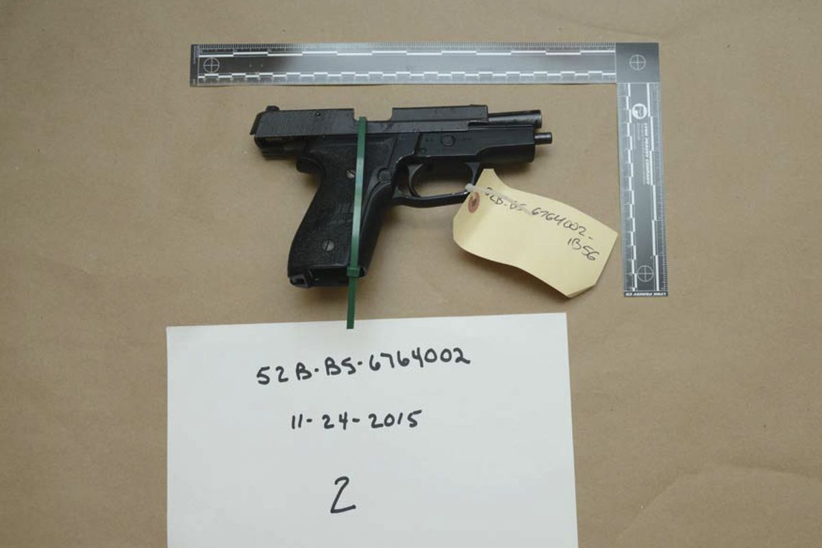 FILE - This evidence photo from the criminal complaint of the U.S. District Court for Massachusetts v. Ashley Bigsbee for illegal possession of a stolen firearm on Nov. 15, 2015, in Suffolk, Mass., shows one of ten M11 semiautomatic handguns that former Army Reserve member James Morales stole from the Lincoln Stoddard Army Reserve Center in Worcester, Mass. Overall, AP has found that at least 2,000 firearms from the Army, Marines, Navy or Air Force were lost or stolen during the 2010s.  (United States District Court for the District of Massachusetts via AP)