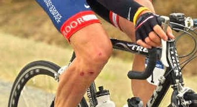 
Lance Armstrong's knee is a little worse for wear after a crash in the sixth stage on Friday. 
 (Associated Press / The Spokesman-Review)