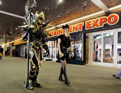 
Webzen life-size action game figures Jeff Hofferer, left, who portrays 
