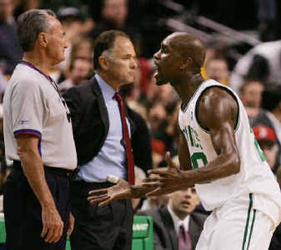 
Boston's Gary Payton, right, pleads his case after being called for a foul by referee Jack Nies. 
 (Associated Press / The Spokesman-Review)