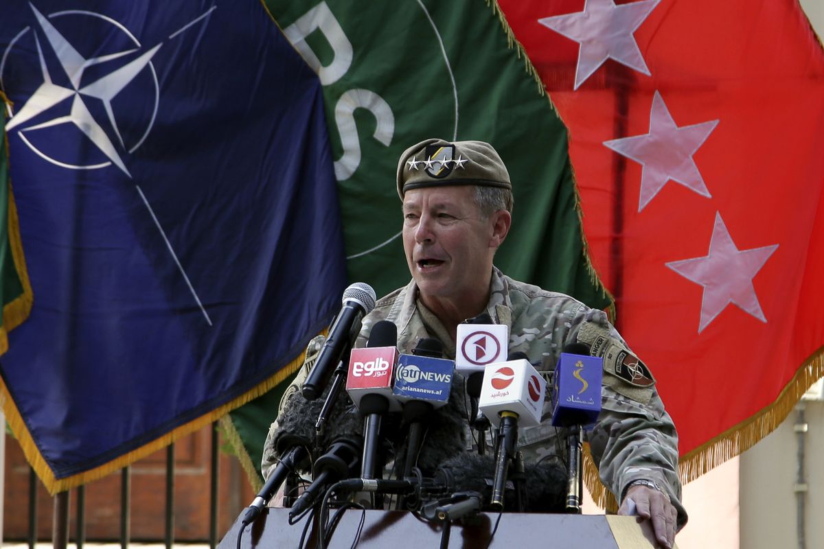 U.S. Army Gen. Scott Miller, the top U.S. commander in Afghanistan, speaks at a ceremony where he relinquished his command, at Resolute Support headquarters, in Kabul, Afghanistan, Monday, July 12, 2021. The United States is a step closer to ending a 20-year military presence that became known as its "forever war," as Taliban insurgents continue to gain territory across the country.  (Ahmad Seir)