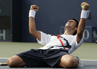 
Novak Djokovic of Serbia celebrates record-tying victory over Radek Stepanek of the Czech Republic at the U.S. Open. Associated Press
 (Associated Press / The Spokesman-Review)