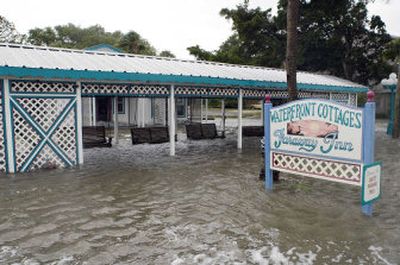 
The sign in front of rental cottages in Cedar Key, Fla., on Tuesday lives up to its claim after tropical storm Alberto passed over the area, leaving little damage by winds but lots of flooding in the area. 
 (Associated Press / The Spokesman-Review)