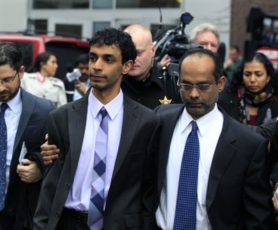 Dharun Ravi, left, and his father, Ravi Pazhani, leave court in New Brunswick, N.J., on Friday. Ravi was convicted of bias intimidation and invasion of privacy. (Associated Press)