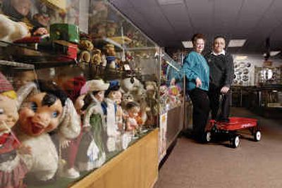 
Jim and Nida Gyorfy stand near their collections of items, ranging from antique toys to war memorabilia, at their Collectors' Corner Musuem in Idaho Falls. 
 (Associated Press / The Spokesman-Review)