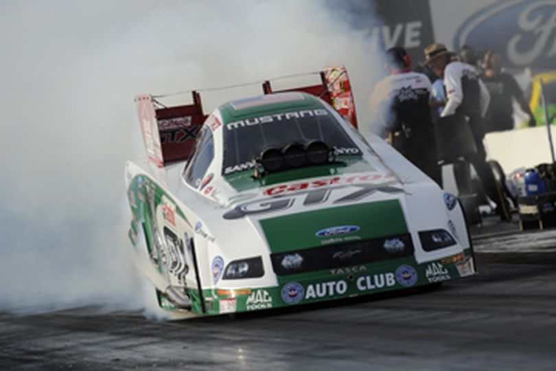 Ashley Force Hood powers her NHRA Full Throttle Funny Car off the line. (Photo courtesy of NHRA) (The Spokesman-Review)