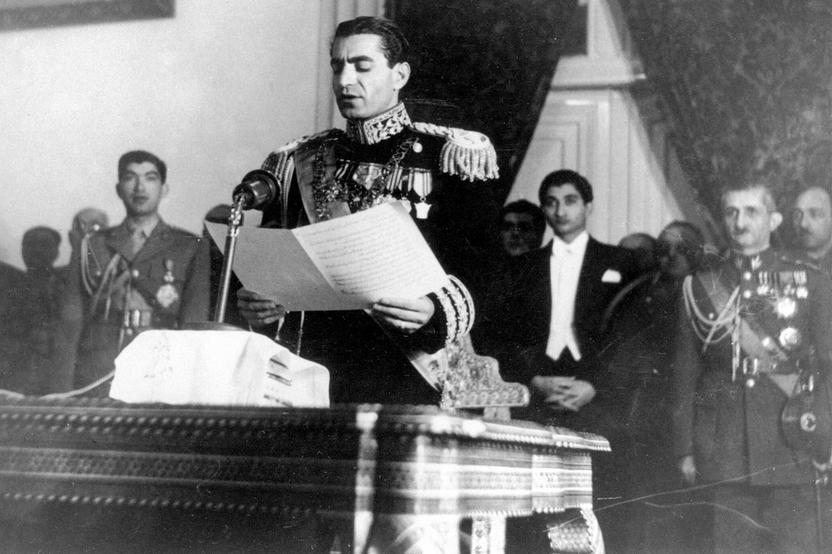 In this Feb. 16, 1950 photograph, the Shah of Iran Mohammad Reza Pahlavi reads his inaugural speech at the initial session of his nation