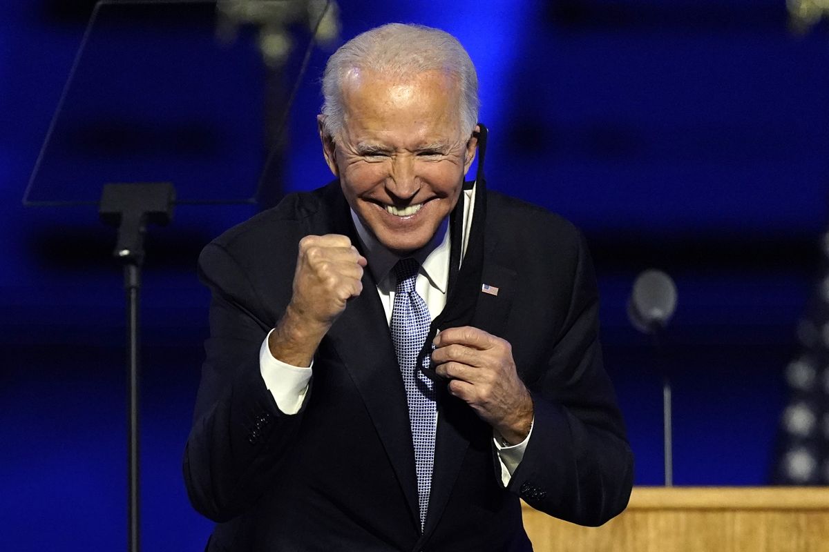 President-elect Joe Biden gestures to supporters Saturday, Nov. 7, 2020, in Wilmington, Del.  (Andrew Harnik)