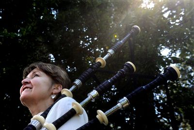 Bagpiper Mary Jane Shea, 60, of Spokane and Sandpoint, is a student at the Coeur d’Alene Summer School of Piping and Drumming at North Idaho College in Coeur d’Alene. “It’s haunting, beautiful music,” she said. (Kathy Plonka / The Spokesman-Review)
