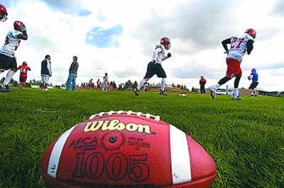 Getting loose and staying warm were priorities on the first day of spring football drills at Eastern Washington.
(Christopher Anderson / The Spokesman-Review)