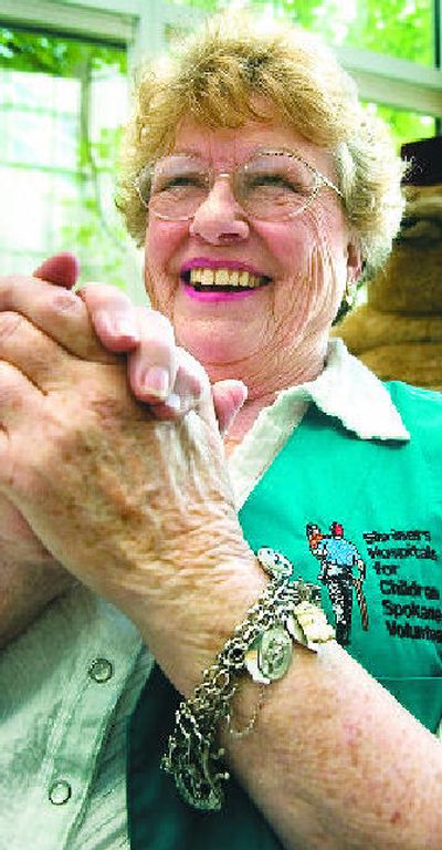 
Harshman wore the bracelet this week while doing her volunteer work at the Shriners Hospital in Spokane.
 (Photosbby CHRISTOPHER ANDERSON / The Spokesman-Review)