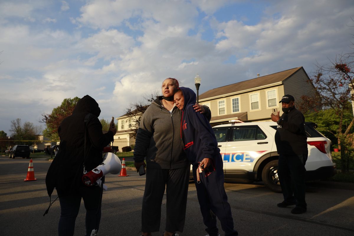 Hazel Bryant is embraced after addressing a crowd with her anger at the Columbus Police over the shooting of her niece, Ma’Khia Bryant, Tuesday, April 20, 2021, near Legion Lane on the east side of Columbus, Ohio. (Brooke LaValley)
