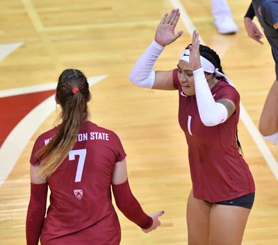 Washington State outside hitter Penny Tusa serves during a Sept. 26 match against Washington.  (SHELLY HANKS/WSU ATHLETICS)