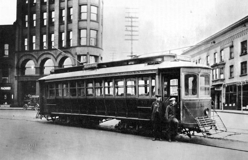 Washington Water Power car No. 96 had finished distributing newspapers for local delivery by paper boys and stopped in front of the Review Building at Monroe and Riverside before returning to the carbarn. The newspaper cars usually ran early in the morning, beginning work at about 2:30, and finishing around 5 a.m. Photo courtesy of Eastern Washington State Historical Society, Ingalls Photo