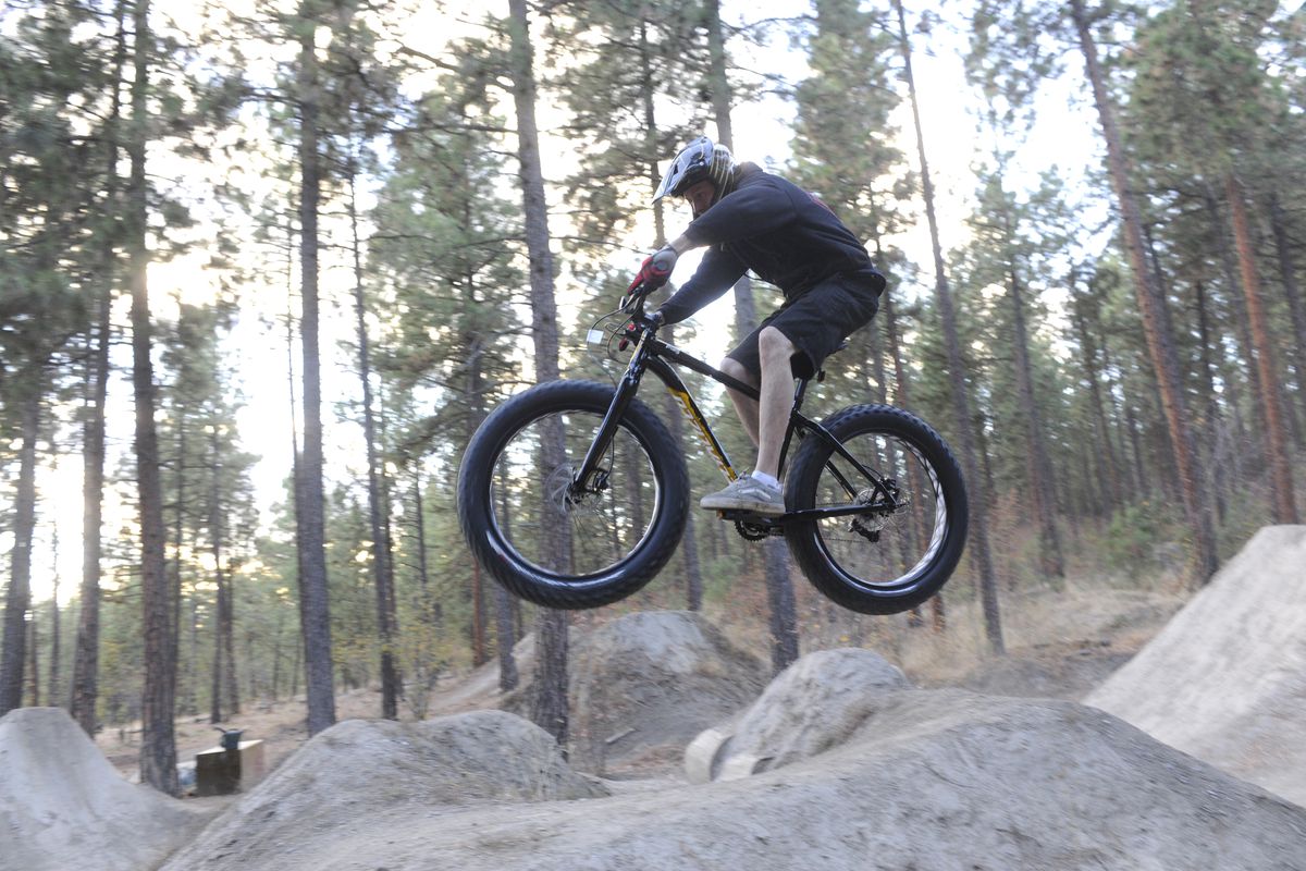 Ruk Kuchenbecker takes some jumps with a Fatboy at the Beacon Hill jumps at Camp Sekani. (Jesse Tinsley)