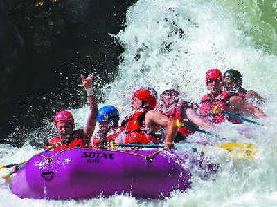 
Rafters celebrate at the bottom of 14-foot Husum Falls on the White Salmon River.
 (Photo by All Adventures Rafting / The Spokesman-Review)