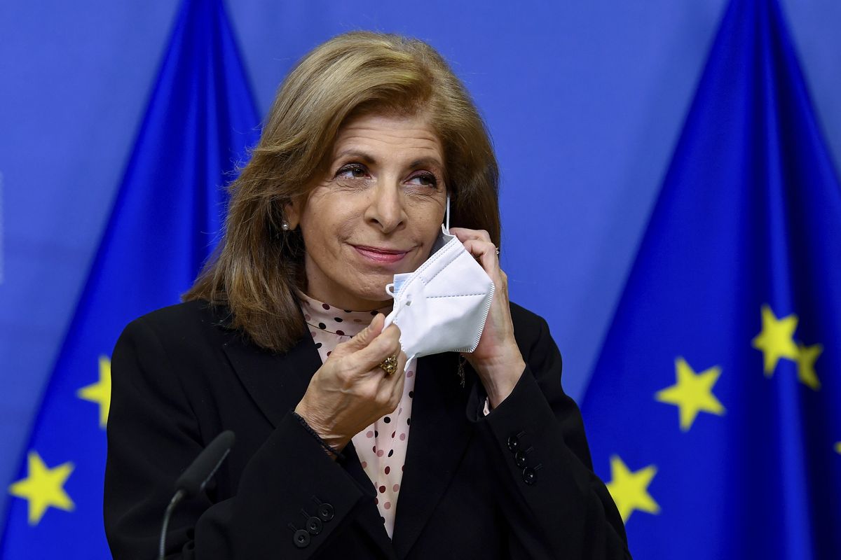European Commissioner in charge of Health Stella Kyriakides removes her face mask as she gives a statement at the European Commission headquarters in Brussels, Monday, Jan. 25, 2021. The European Union lashed out Monday at the pharmaceutical giant AstraZeneca, accusing the company of failing to deliver the coronavirus vaccine doses to the bloc that it initially promised despite being funded by the bloc to ramp up production.  (John Thys)
