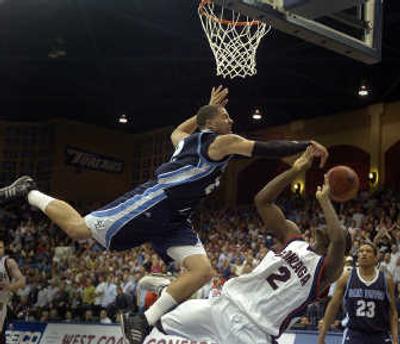 
Rob Jones of San Diego aggressively blocks Jeremy Pargo's shot. 
 (Christopher Anderson / The Spokesman-Review)