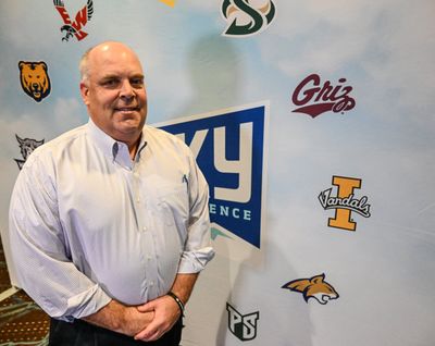 Big Sky Conference Commissioner Tom Wistrcill stands in front of a backdrop at the Big Sky Conference media day on Monday at Northern Quest Casino. (Jesse Tinsley/THE SPOKESMAN-REVI)