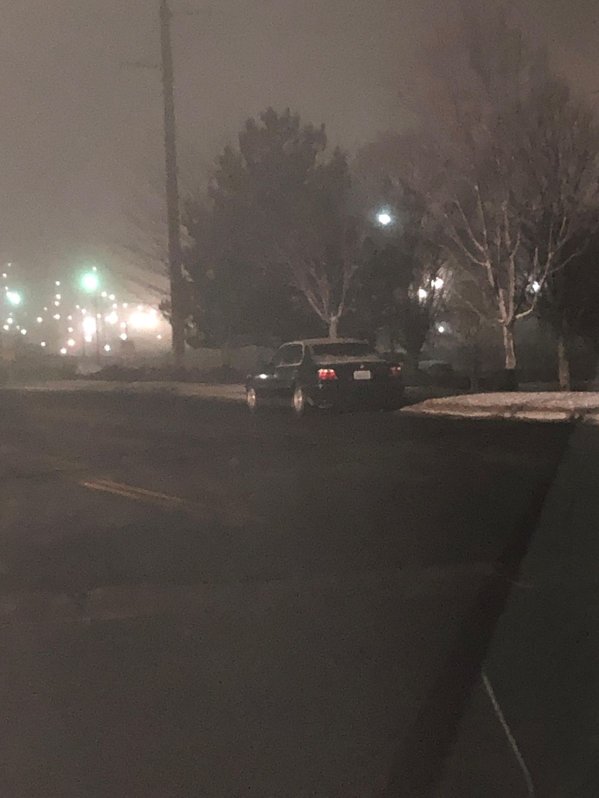 A black BMW belonging to Ryan S. Palmer is shown Thursday, Dec. 27, 2018, in an industrial area in Moses Lake. Authorities said they found bomb-making materials in the car during a routine traffic stop, and Palmer, 39, allegedly told investigators he had toyed with the idea of blowing up an agricultural products plant where he used to work. (Grant County Sheriff’s Office)